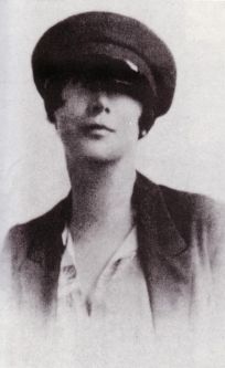 Olive in captain's hat